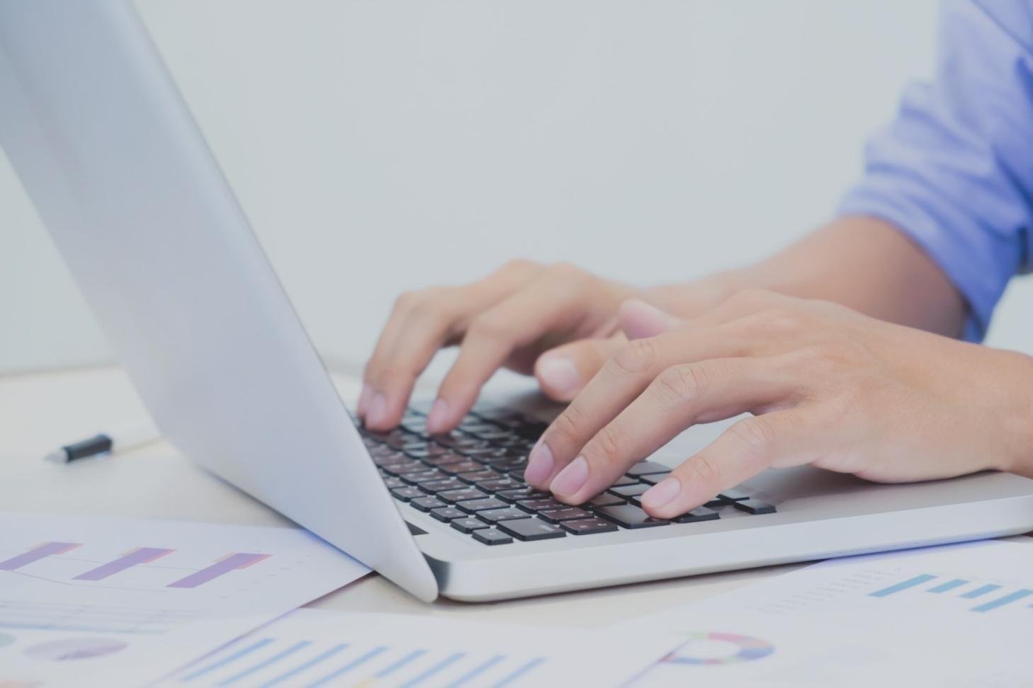 Developer analyzing blockchain performance metrics on multiple monitors